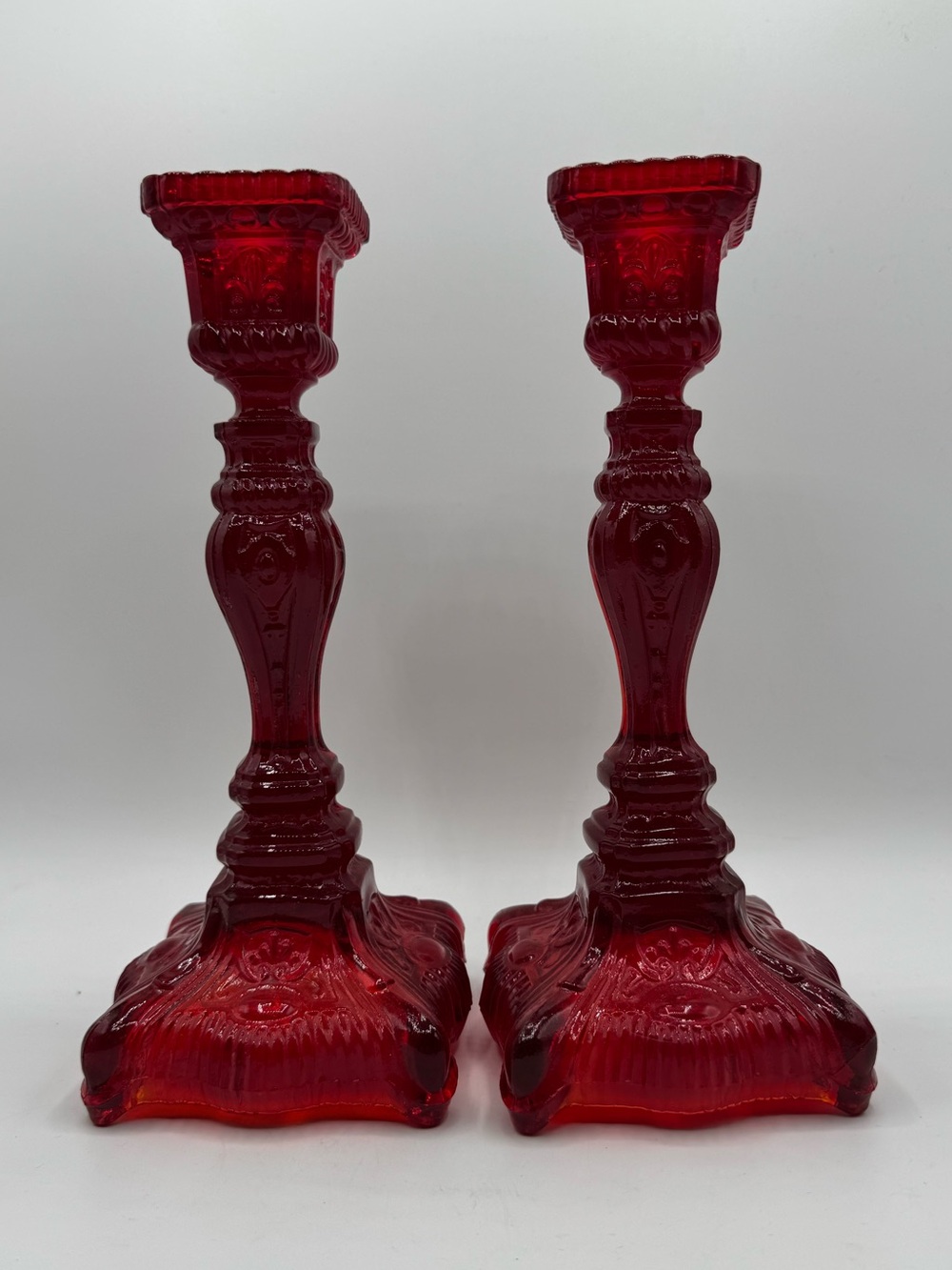 Vintage Pair of Ivima Portugal Fleur de Lis Candlesticks Red Glass UV Reactive
